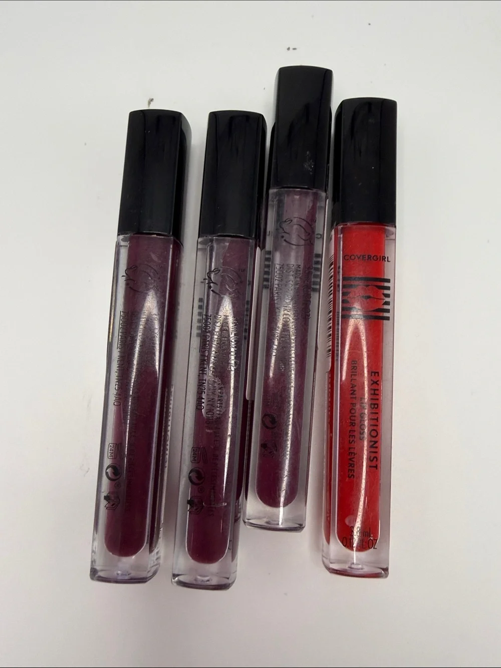 COVERGIRL Exhibitionist Lip Gloss Set – Red and Plum Shades